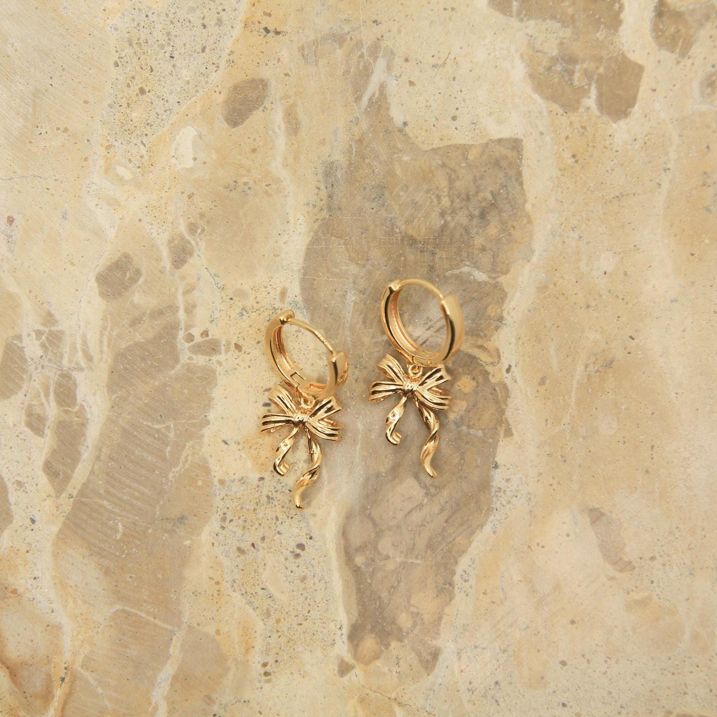 Gold Bow Huggie Hoop Earrings