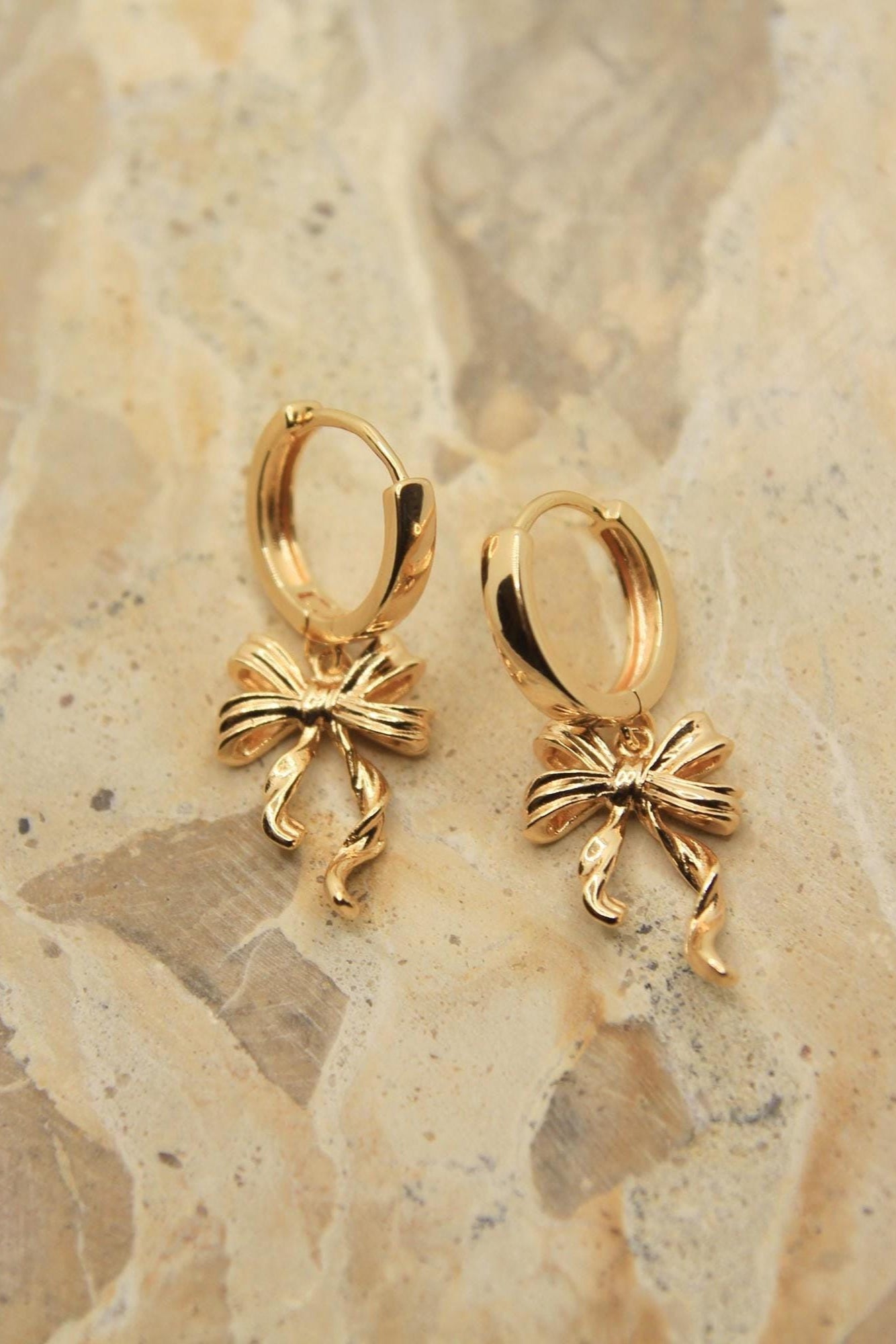 Gold Bow Huggie Hoop Earrings