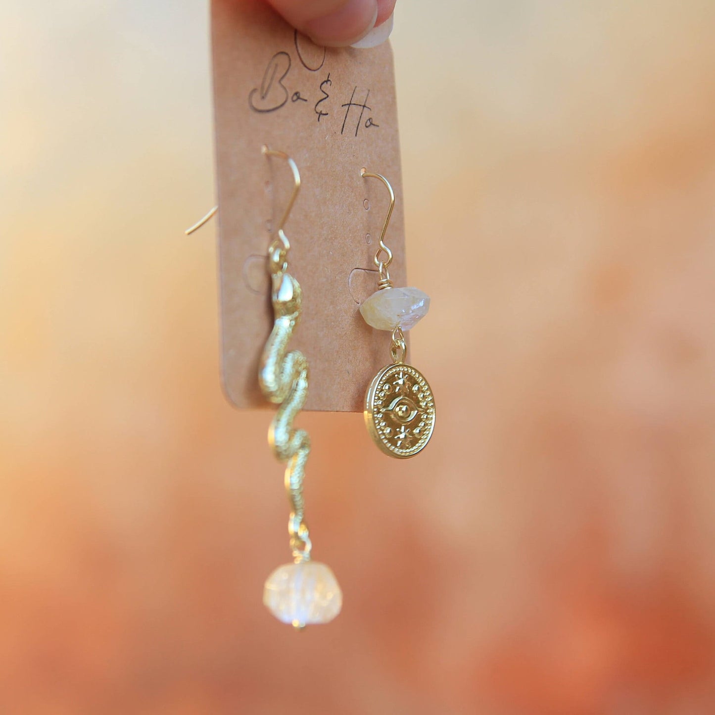 Gold Snake and Starry Eye Earrings