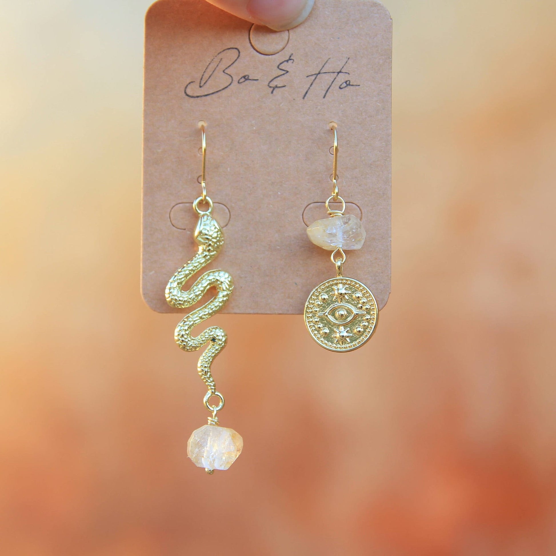 Gold Snake and Starry Eye Earrings