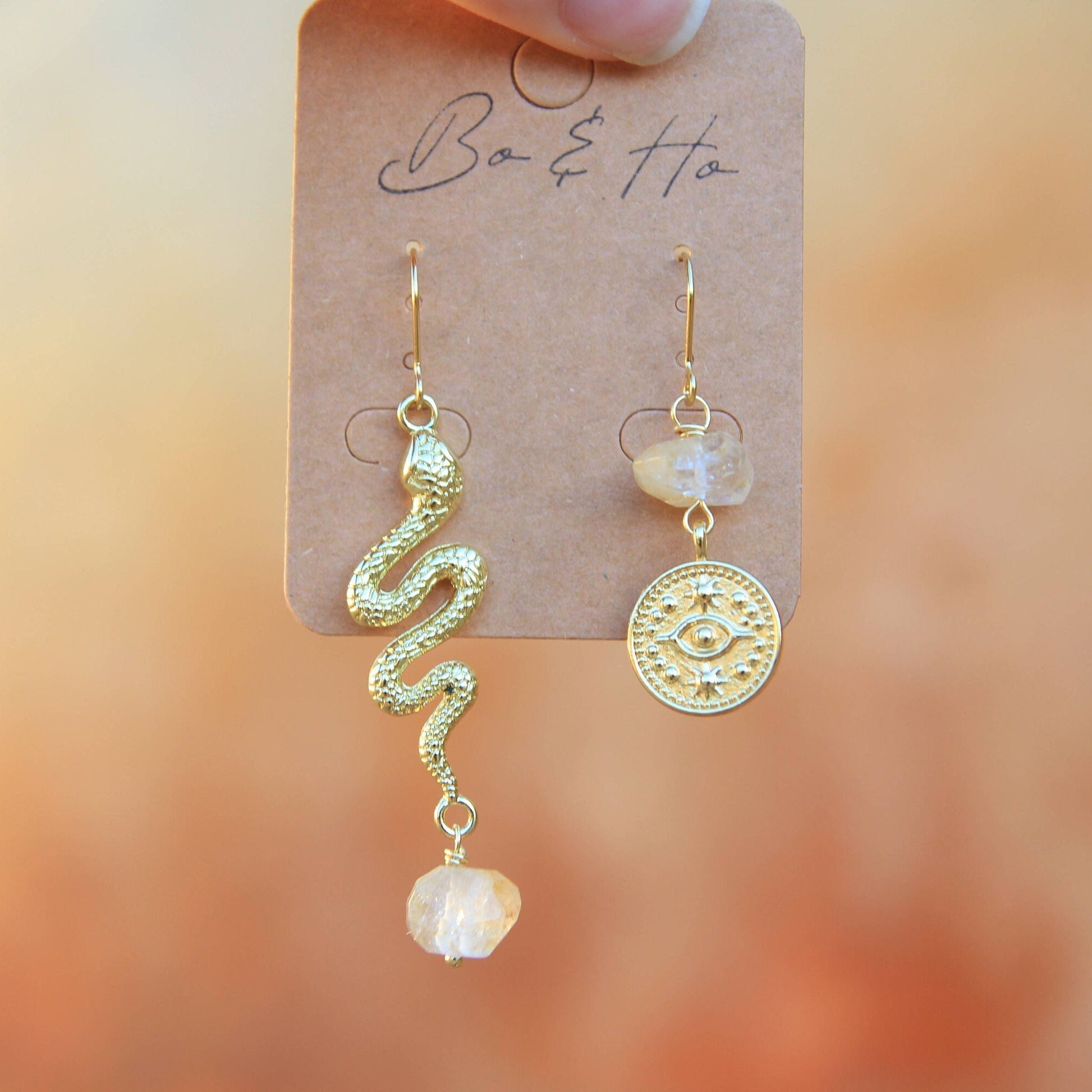 Gold Snake and Starry Eye Earrings
