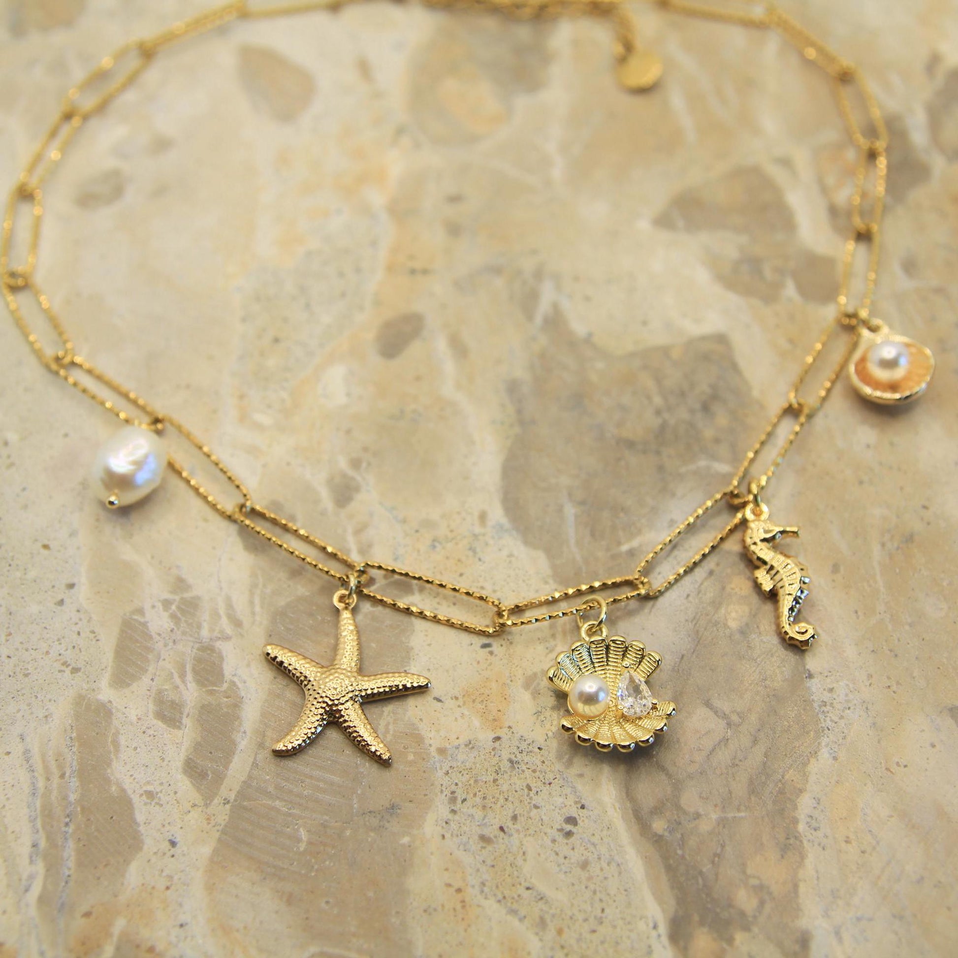 Gold Chunky Charm Beach Inspired Necklace with Pearl, Shells, Starfish and Seahorse