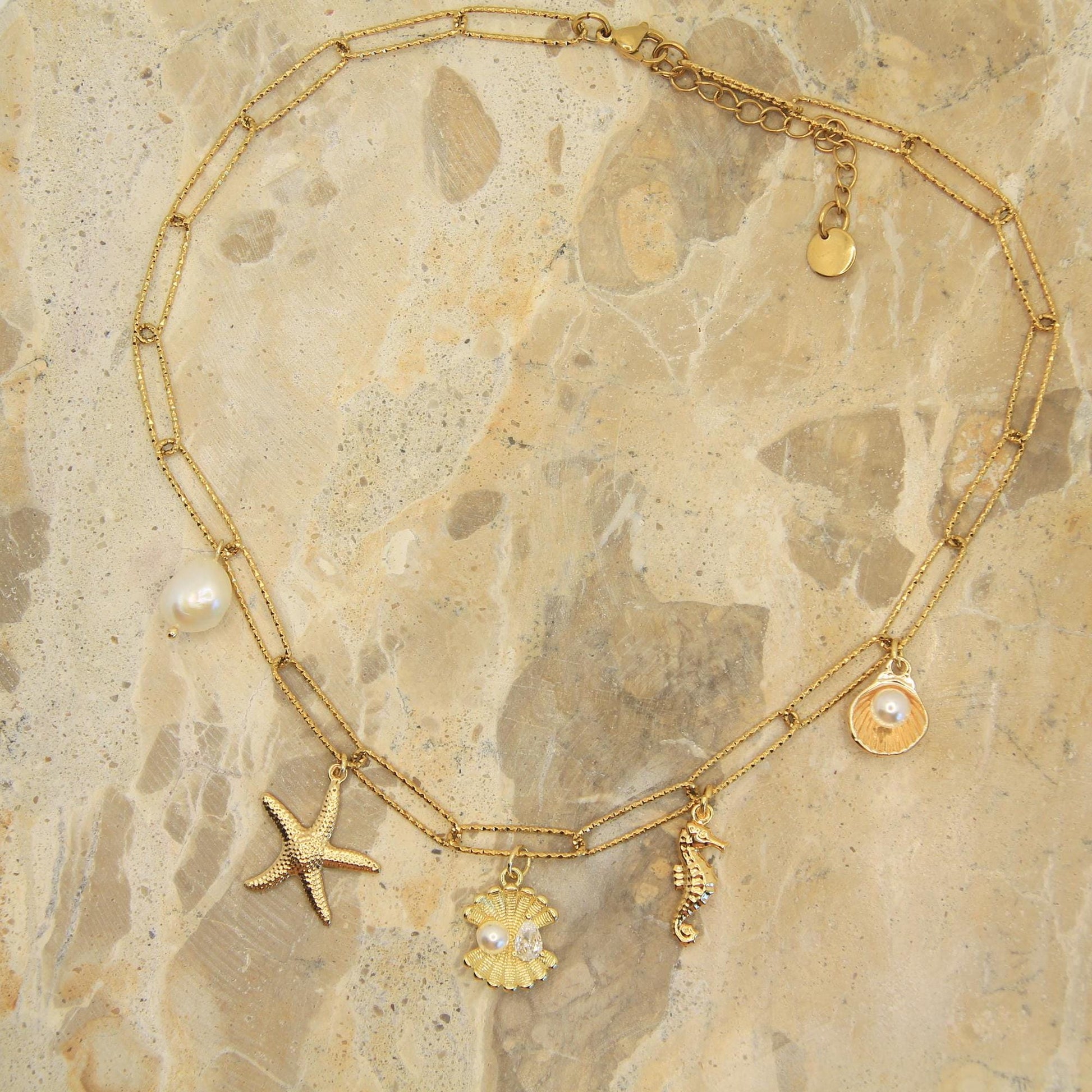 Gold Chunky Charm Beach Inspired Necklace with Pearl, Shells, Starfish and Seahorse