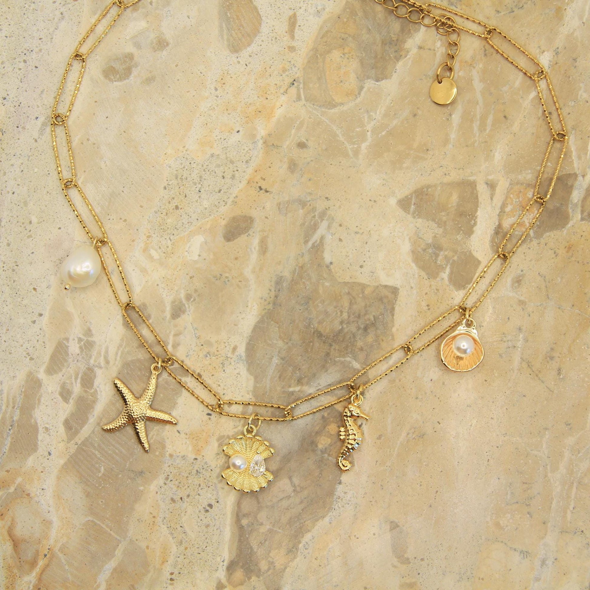 Gold Chunky Charm Beach Inspired Necklace with Pearl, Shells, Starfish and Seahorse