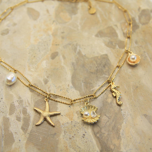 Gold Chunky Charm Beach Inspired Necklace with Pearl, Shells, Starfish and Seahorse