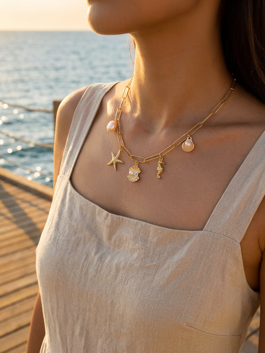 Gold Chunky Charm Beach Inspired Necklace with Pearl, Shells, Starfish and Seahorse