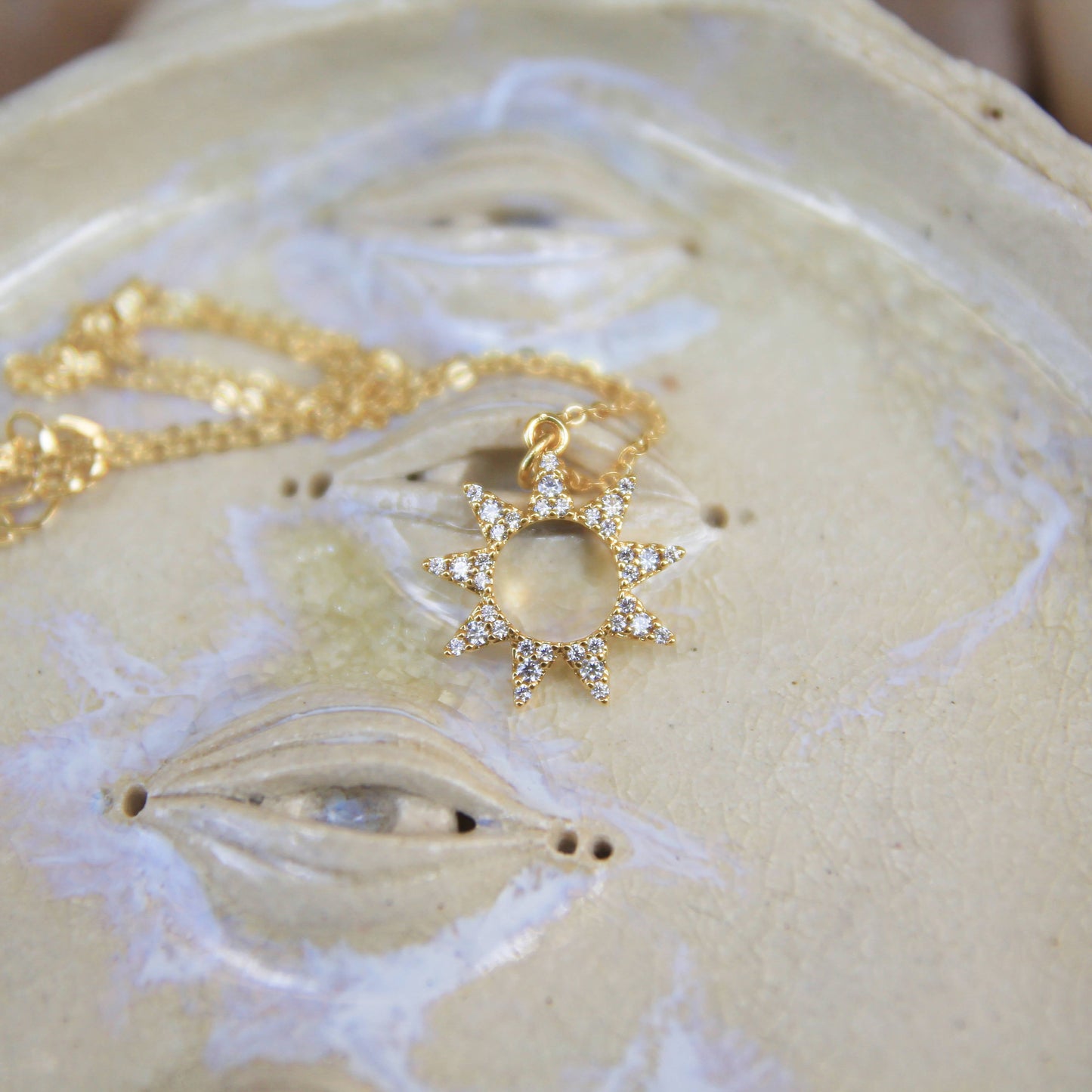 gold sun necklace with cubic zirconia crystals 