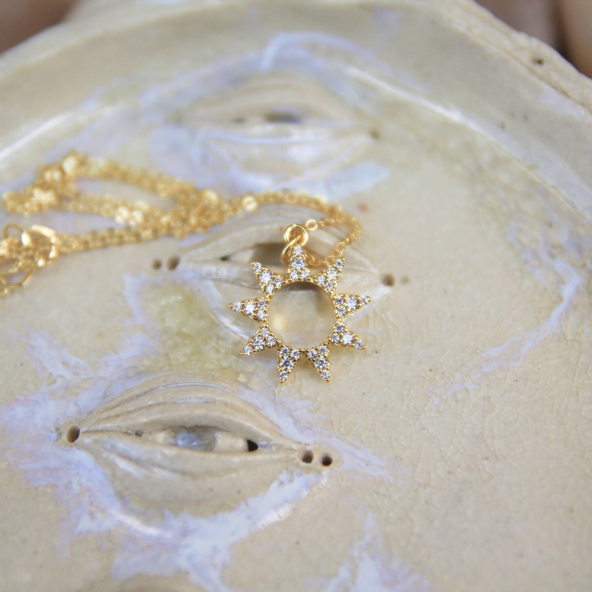 gold sun necklace with cubic zirconia crystals 