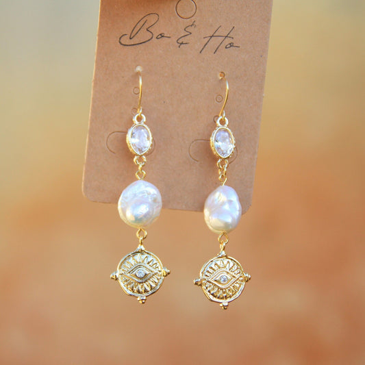 Gold Eye Coin Earrings with Large Freshwater Pearls