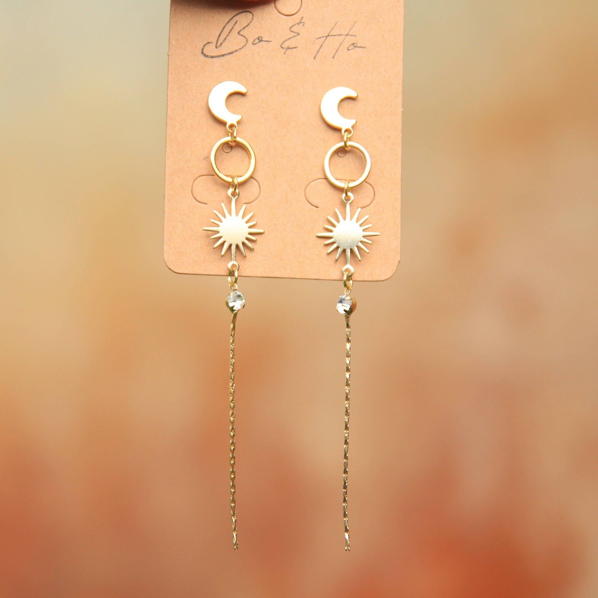 Gold Sun and Moon Dangly Stud Earrings