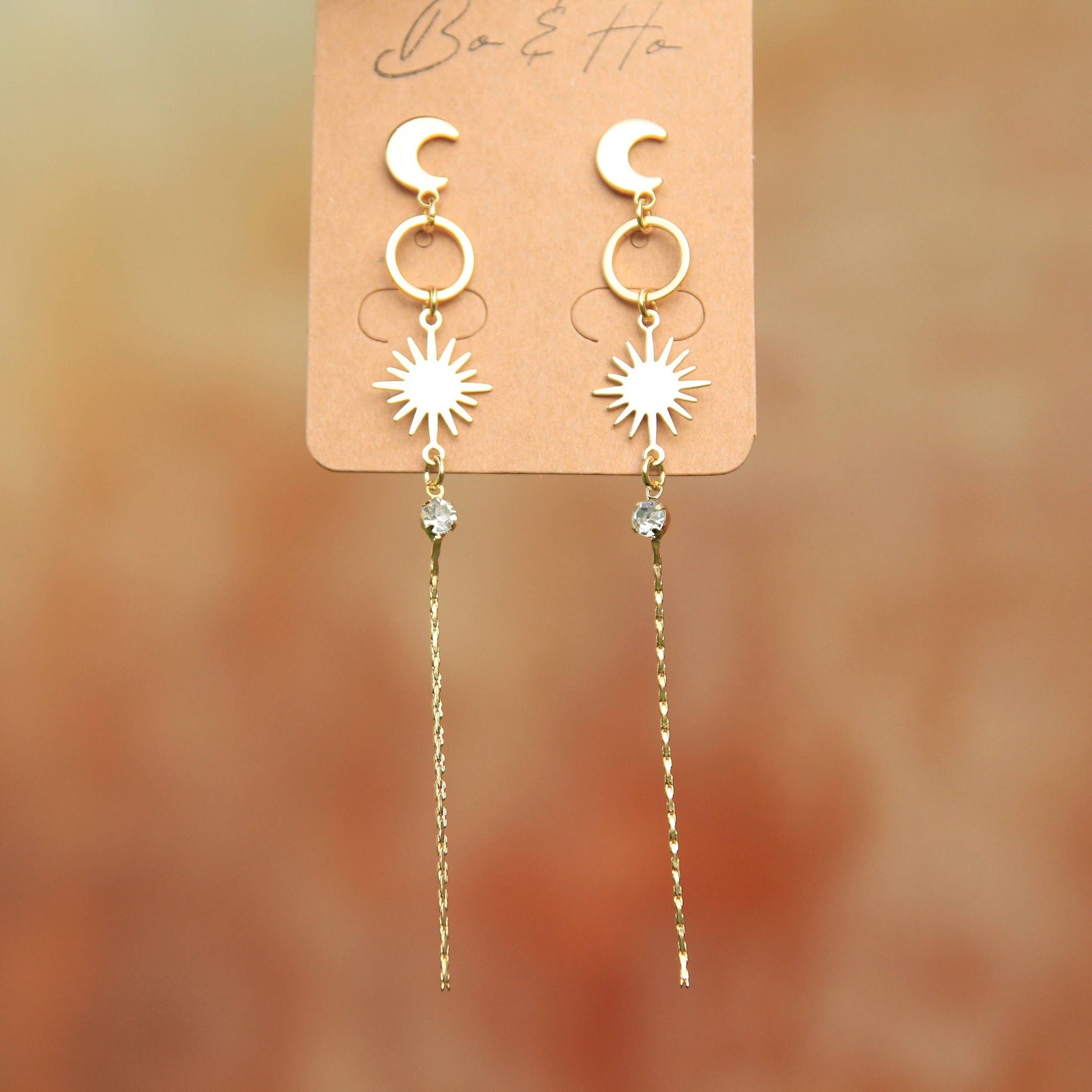 Gold Sun and Moon Dangly Stud Earrings
